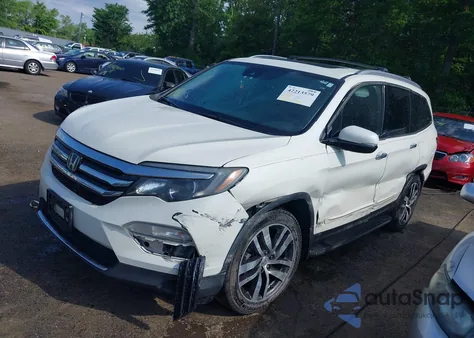 2017 Honda Pilot Touring z USA, uszkodzony, nr VIN 5FNYF6H96HB092820